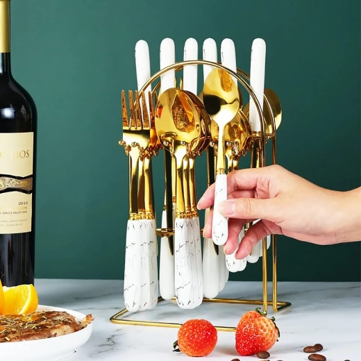 Picture of طقم أدوات مائدة انيق يتميز بمقابض بيضاء رخامية (ملاعق شوكه سكين )